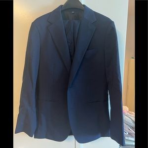 Lightly used slim fit, blue w/ small brown checks suit.